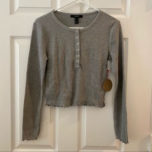 Long sleeved, slightly cropped thermal